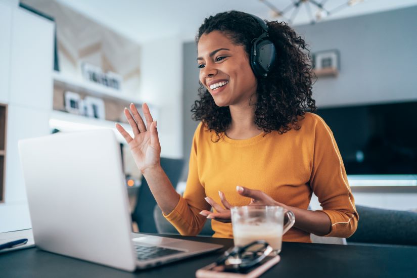 Image of woman working from home in front of her laptop